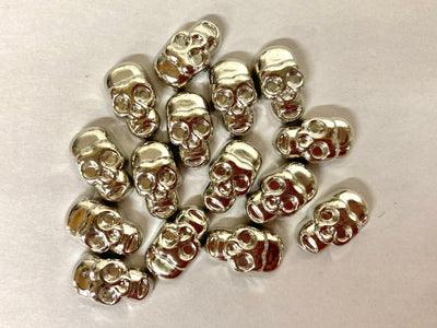 Silver plastic skulls for craft supply