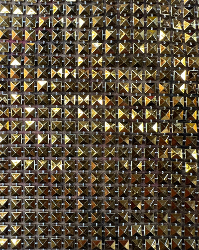 Gold plastic mesh pyramid trim