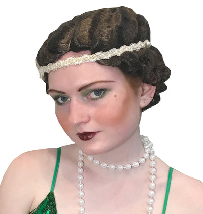 Gatsby WigWell, hello there old sport... it's the Gatsby Wig! Take on the golden age of jazz with this 1920's-inspired style. Ideal for anyone drinking a tall Manhattan in a prohibition-era speakeasy. the great gastby  speakeasy  Short Wigs  gatsby wig  gatsby  flapper wig  flapper  daisy  40s  30s  20s
